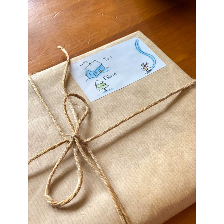 Festive Gift Label by Little Difference displayed on present