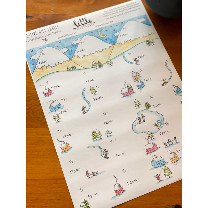 Festive Gift Labels Sheet by Little Difference displayed on table